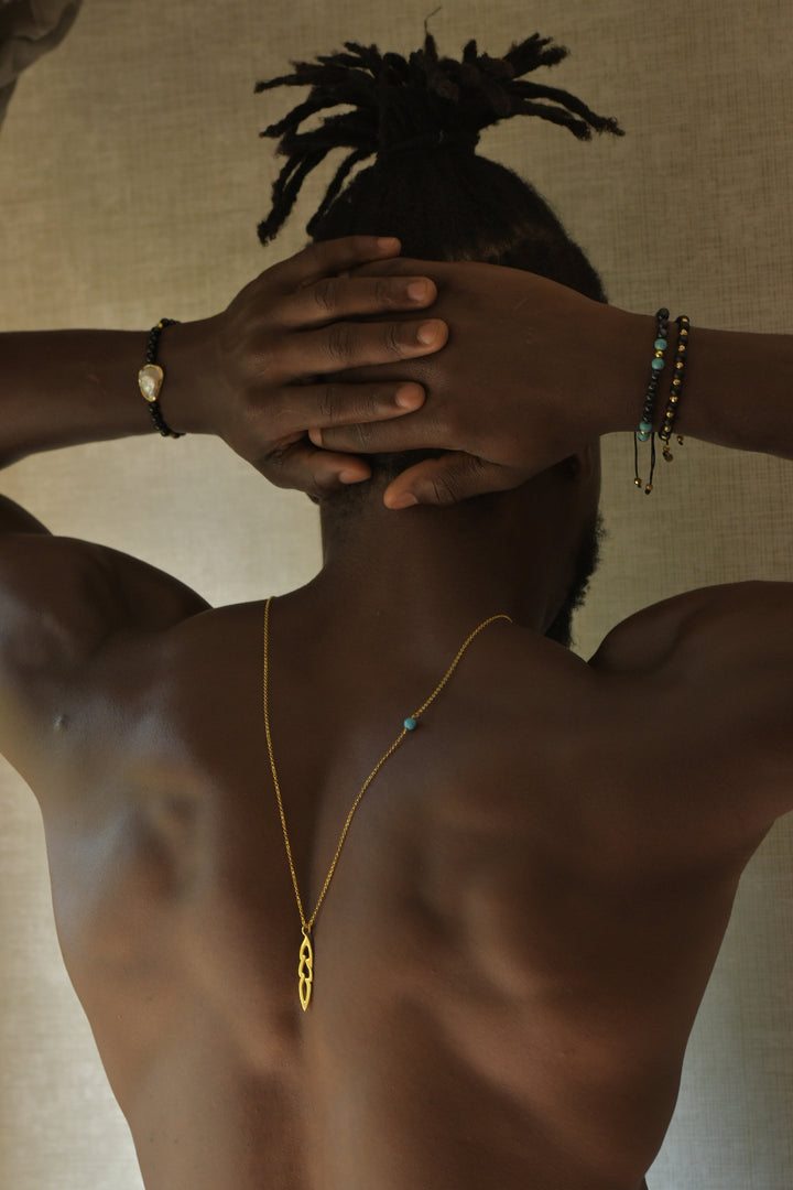 Open feather necklace gold plated